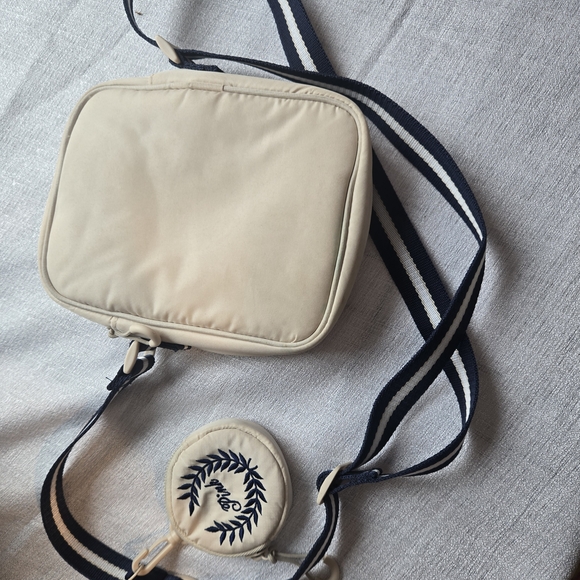 Victoria's Secret Handbags - Victoria's Secret Cream Crossbody Bag with Navy Strap